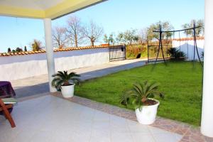 Zahrada ubytování Ema Holiday Home