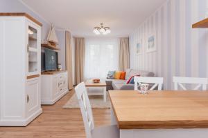 Kuchyňa alebo kuchynka v ubytovaní Jantar Apartamenty Exclusive Polanki Park SPA