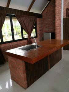 Koupelna v ubytování Homestay ALA Riverview Lodge Kota Bharu
