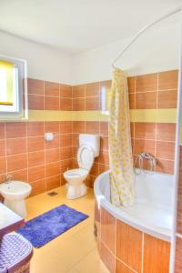 Koupelna v ubytování Ema Holiday Home