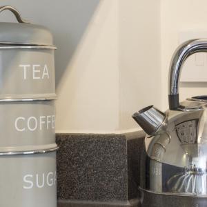 a kitchen counter with a coffee maker and a coffee pot at Citystay - Citygate in Cambridge