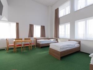 Postel nebo postele na pokoji v ubytování WinBudget "bed&breakfast"