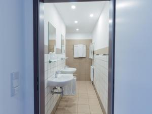 Koupelna v ubytování WinBudget "bed&breakfast"