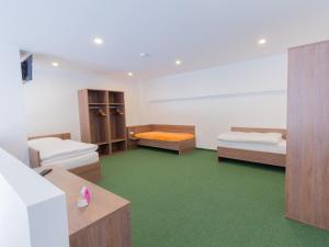 Postel nebo postele na pokoji v ubytování WinBudget "bed&breakfast"