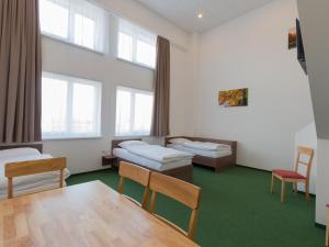Postel nebo postele na pokoji v ubytování WinBudget "bed&breakfast"