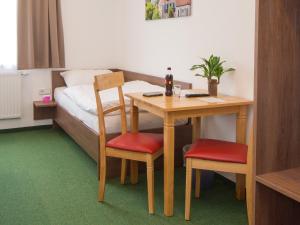 Postel nebo postele na pokoji v ubytování WinBudget "bed&breakfast"