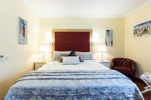 Postel nebo postele na pokoji v ubytování Linton Hotel Luton + 37 fotografií