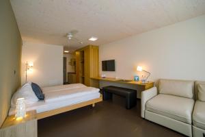 Postel nebo postele na pokoji v ubytování Hotel Frauenfeld