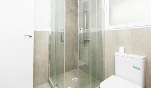 Ванная комната в Apartamentos Centro Granada +70 фотографий