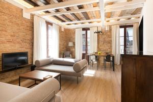 Svetainės erdvė apgyvendinimo įstaigoje Decô Apartments Barcelona-Born Apt.