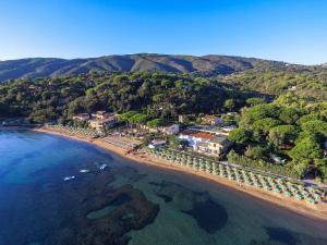 an aerial view of a beach with houses and the water at Residence Le Acacie in Capoliveri