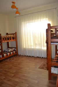 Postel nebo postele na pokoji v ubytování Hostel Korona
