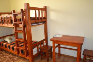 Palanda nebo palandy na pokoji v ubytování Hostel Korona