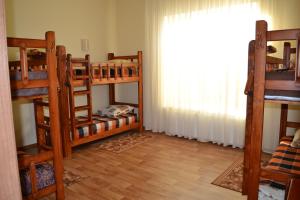 Postel nebo postele na pokoji v ubytování Hostel Korona