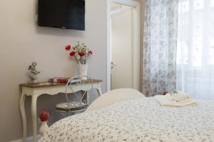 Postel nebo postele na pokoji v ubytování Magnolia St.Peter's Suites