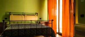 Двуетажно легло или двуетажни легла в стая в Santa Giusta