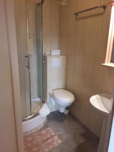 Kúpeľňa v ubytovaní Hotel Paola + 16 fotografií