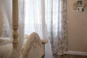 Postel nebo postele na pokoji v ubytování Magnolia St.Peter's Suites