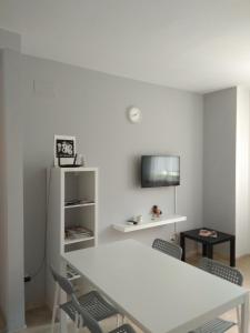 Et tv og/eller underholdning på Apartamento Granada Monachil II