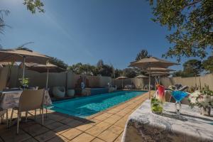 The swimming pool at or close to Ivory Manor Boutique Hotel