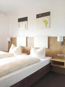 Postel nebo postele na pokoji v ubytování Hotel Schaider