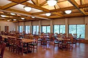 a large room with tables and chairs and windows at Blue Licks Battlefield State Park in Carlisle
