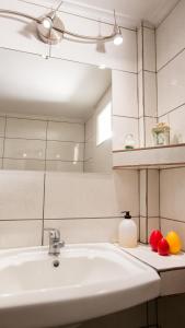 Koupelna v ubytování Petaluda House 1