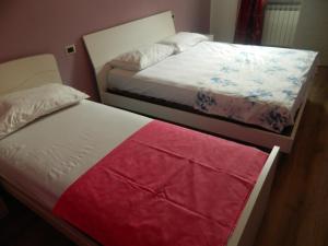 Ein Bett oder Betten in einem Zimmer der Unterkunft Appartamento Masha Como