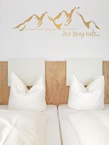 Postel nebo postele na pokoji v ubytování Hotel Schaider