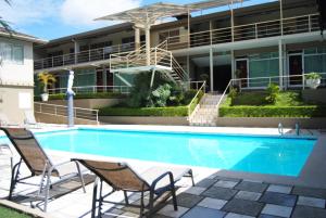 Majoituspaikassa Hotel Vista De Golf, San Jose Aeropuerto, Costa Rica tai sen lähellä sijaitseva uima-allas