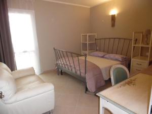 A bed or beds in a room at All'Antica Ruggine Még 37 kép