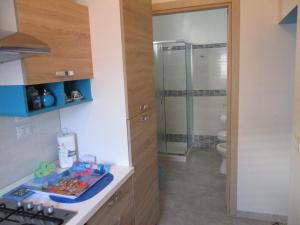 A kitchen or kitchenette at Azzurro Cielo
