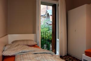 A bed or beds in a room at Studio in Casa Cogollo