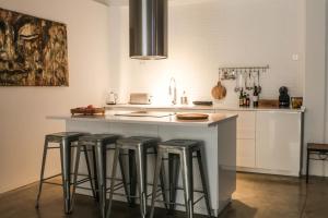 Kuchyňa alebo kuchynka v ubytovaní Apartment Triador