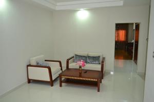 Posezení v ubytování Hamdan Plaza Hotel Salalah, an HTG Hotel