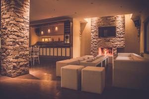 a living room with a stove and a fireplace at La Finca Multiespacio in San Rafael +51 photos