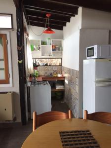 Una cocina o kitchenette en CABAÑA ÚNICA