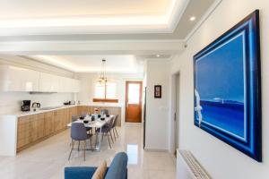 A kitchen or kitchenette at Leo - Unique Glyfada Apartment