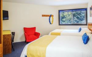 Ένα ή περισσότερα κρεβάτια σε δωμάτιο στο The Bulldog Hotel