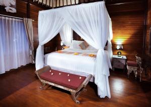 Кровать или кровати в номере Griya Valud