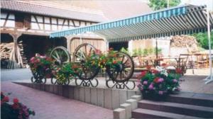 Fotografie z fotogalerie ubytování Ferme Auberge du Moulin des Sept Fontaines v destinaci Drachenbronn