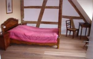 Postel nebo postele na pokoji v ubytování Ferme Auberge du Moulin des Sept Fontaines + 12 fotografií