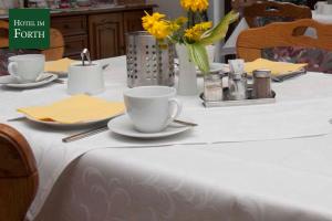 Ein Restaurant oder anderes Speiselokal in der Unterkunft Hotel im Forth 