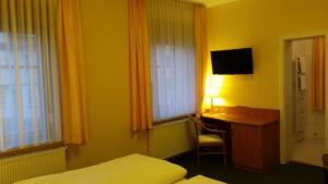 TV a/nebo společenská místnost v ubytování Hotel Thüringer Hof