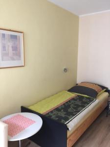 Ein Bett oder Betten in einem Zimmer der Unterkunft Haus Aqua