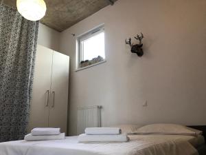 Postel nebo postele na pokoji v ubytování Street Flat