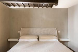 Lova arba lovos apgyvendinimo įstaigoje Le scuderie di Sant'Ambrogio