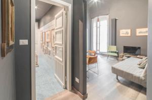 Un pat sau paturi într-o cameră la Appartamento Cellini