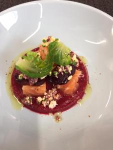 a white plate with a dessert with broccoli and sauce at Hotel-Restaurant Lann Roz / Côte Cuisine in Carnac