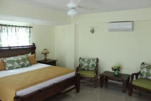 מיטה או מיטות בחדר ב-Hotel Bayahibe